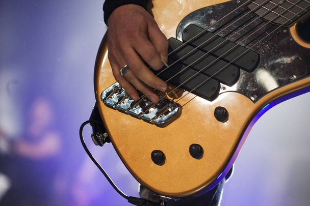 Guitarist on stage, guitar closeup - Фото, зображення