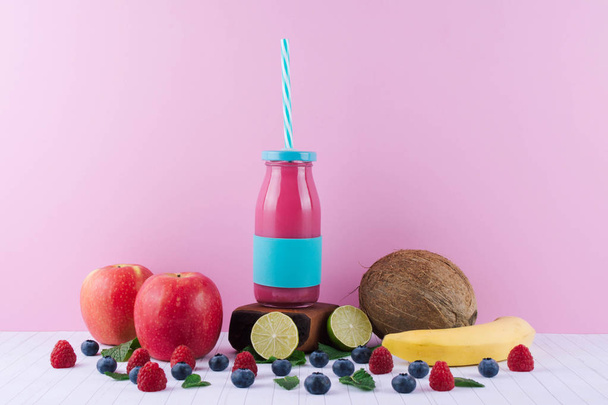 Pink smoothie with fruits and berries. - Fotó, kép