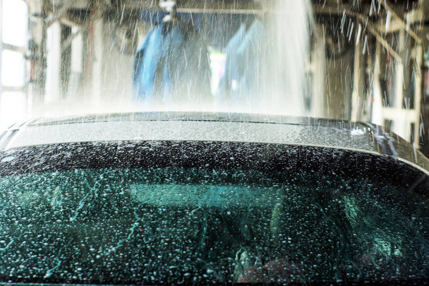 c Automatic car wash in action - Фото, зображення