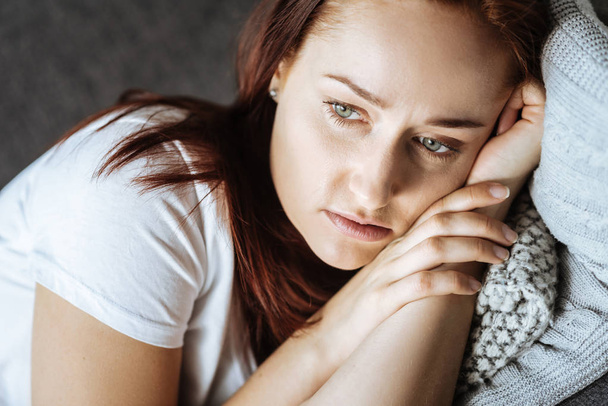 Depressed thoughtful woman focusing in her problems - Фото, зображення