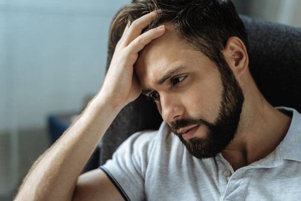 Sad bearded man feeling frustrated - Фото, зображення