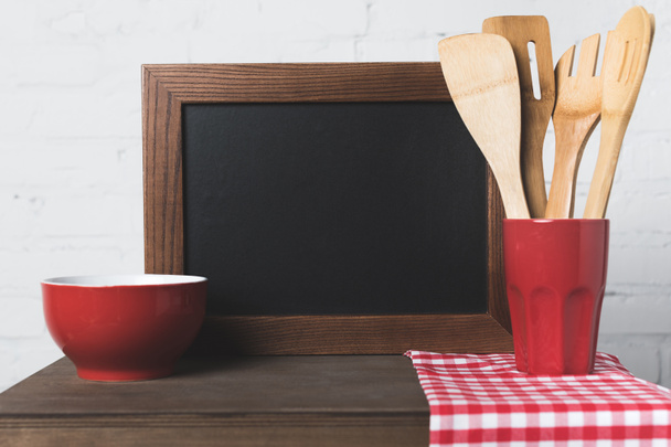 blank board and kitchen utensils - Fotó, kép