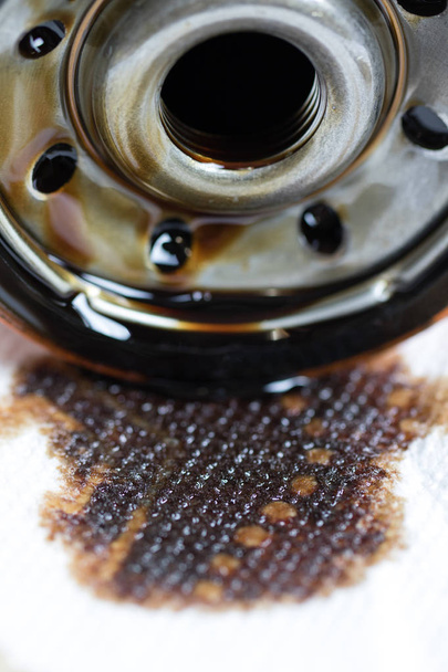 old used motor oil filter close up shot. - Photo, Image