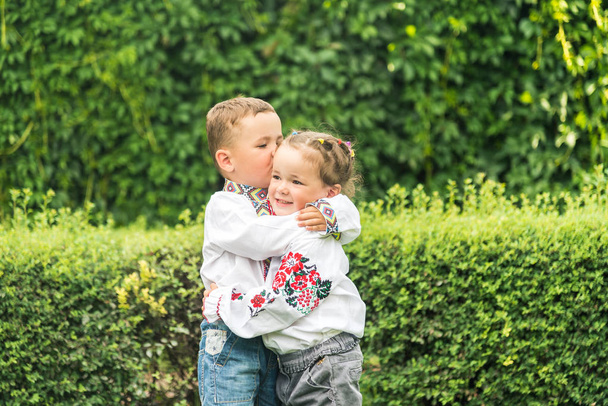 Brother and sister. Brother hugs sister - Foto, Bild