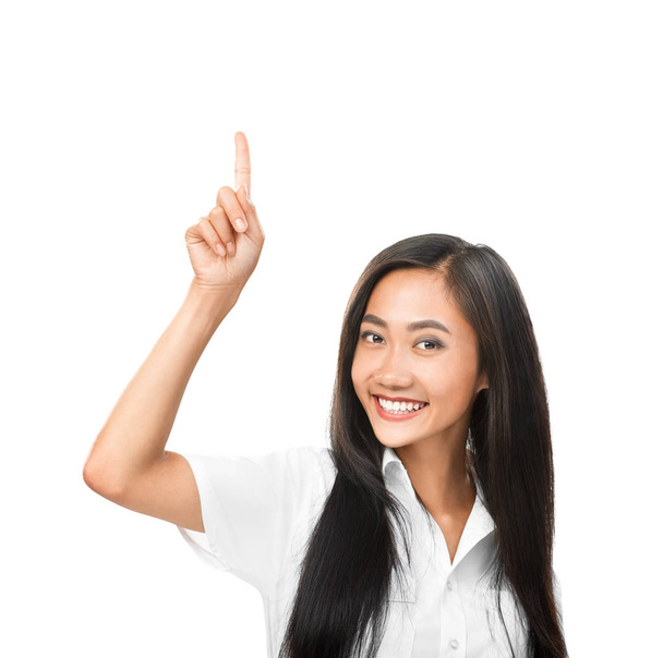 Asian woman pointing up - Photo, Image