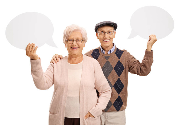 Seniors with speech bubbles - Фото, изображение