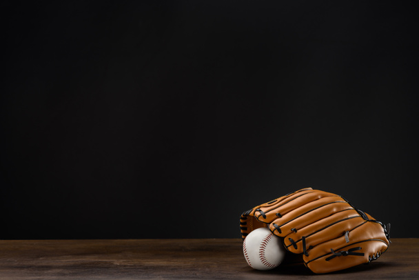 Honkbal mitt en bal - Foto, afbeelding