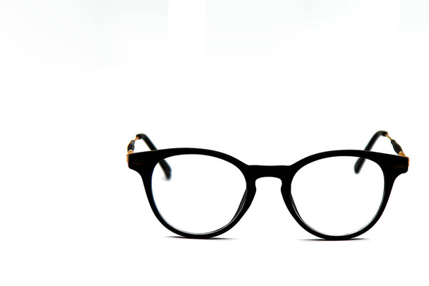 Modern Black and Gold eye glasses isolated on white background - Photo, Image