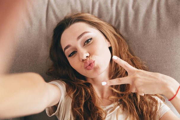 Amazing emotional pretty lady make selfie make peace gesture. - Foto, immagini