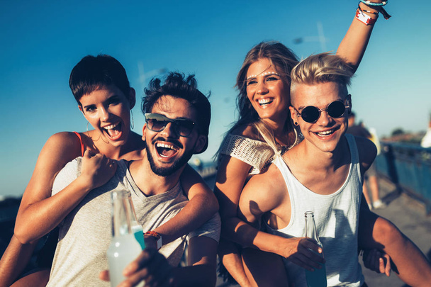 Group of young happy friends having fun time together - Photo, Image