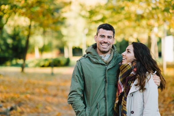 Young happy couple in autumn - Photo, image