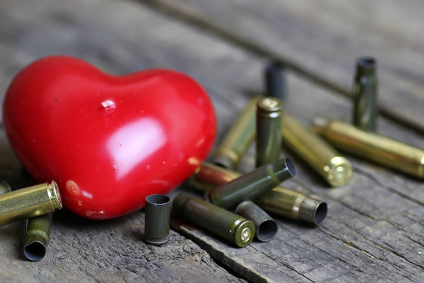 bullet and shape heart - Photo, Image