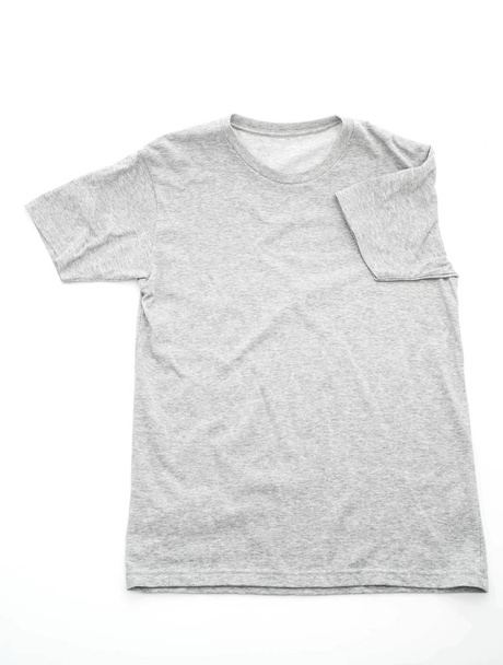 shirt. folded t-shirt on white  - Fotografie, Obrázek