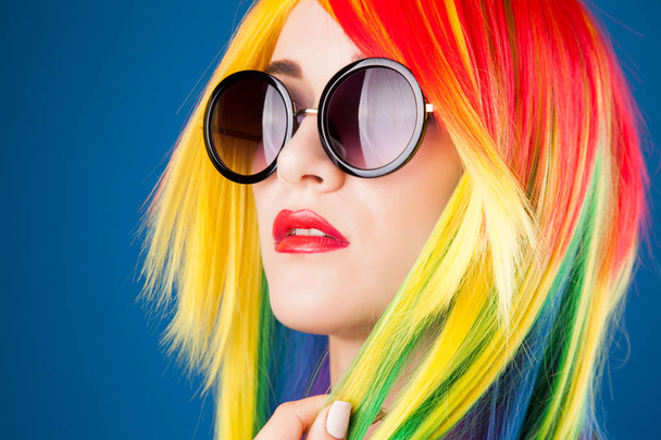 woman wearing color wig  - 写真・画像