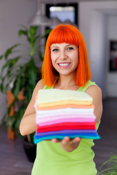 Redhead woman doing laundry  - Photo, Image