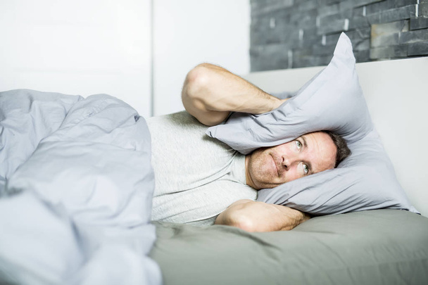 Tired man in the bed - Fotografie, Obrázek