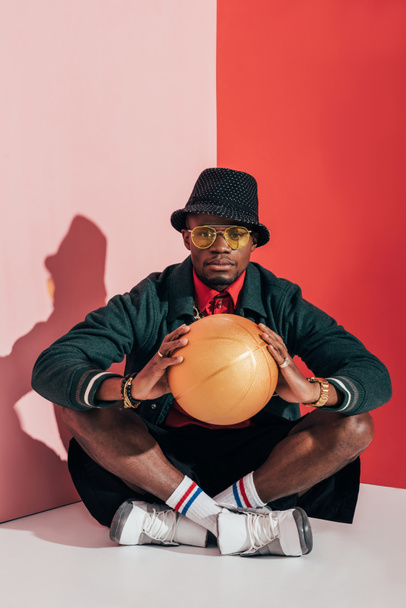 stylish african american man with ball - Foto, Imagem