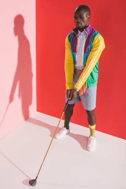 stylish man with golf club - Foto, afbeelding