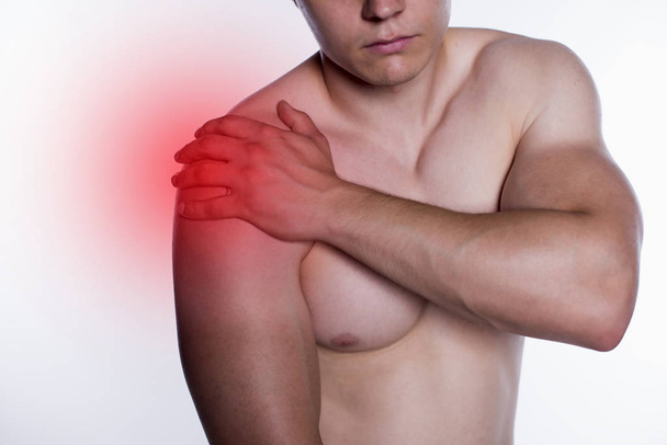 man with pain at shoulder - Zdjęcie, obraz
