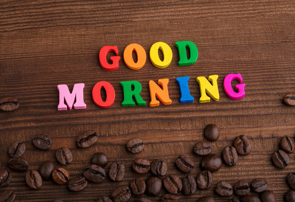 Coffee beans. Good morning. Roasted coffee beans background close up. Coffee beans pile from top with copy space for text. Coffee house. - Photo, Image