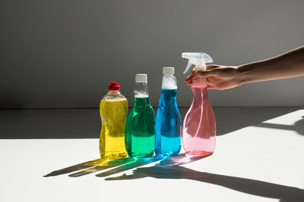 human hand and cleaning fluids - Photo, Image