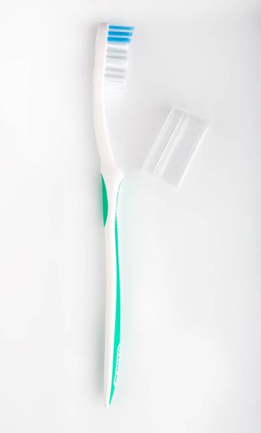 escova de dentes isolada em branco. Higiene pessoal. Uma boca saudável. Comodidades de casa de banho. acessórios
 - Foto, Imagem