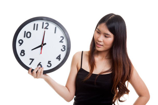 Young Asian woman with a clock. - Φωτογραφία, εικόνα