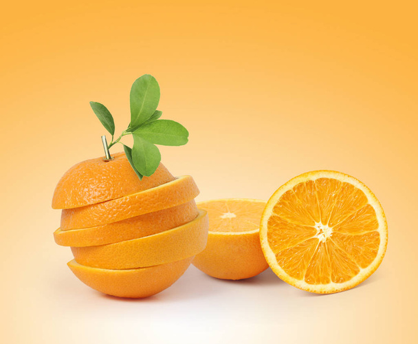  fruit Orange with a leaves isolated - Fotó, kép