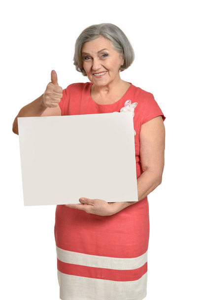  Starsza kobieta z pustą kartę - Zdjęcie, obraz