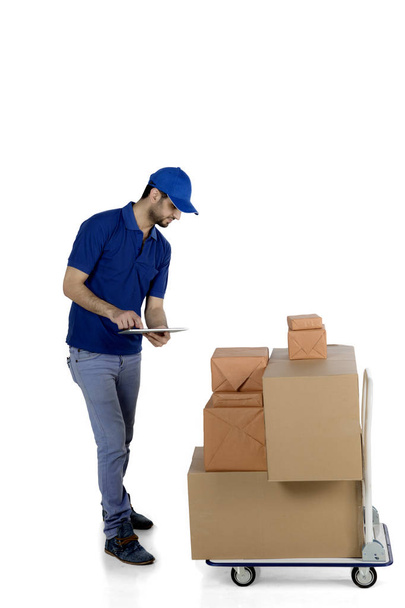 Italian courier checking packages on studio - Foto, Imagem