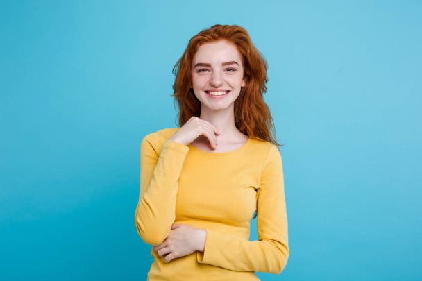 Portrait of happy ginger red hair girl with freckles smiling loo - Valokuva, kuva