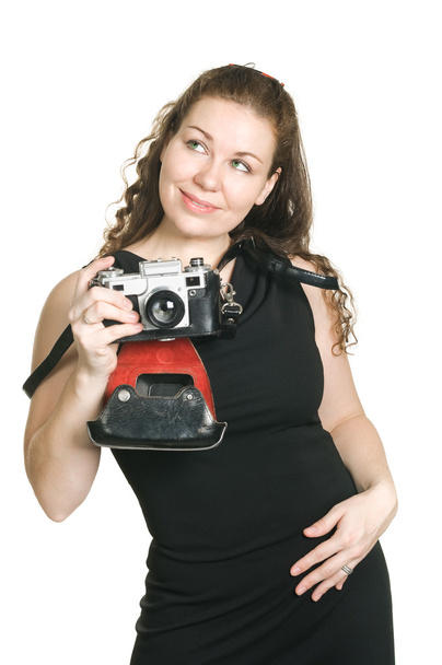 Young woman with ancient camera - 写真・画像