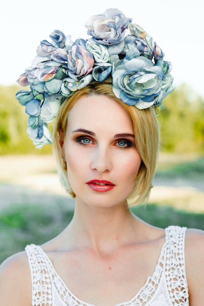 woman in luxurious floral headdress - 写真・画像