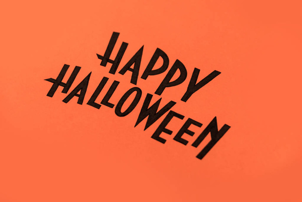Black logo of Halloween painted on orange background - Foto, Imagem