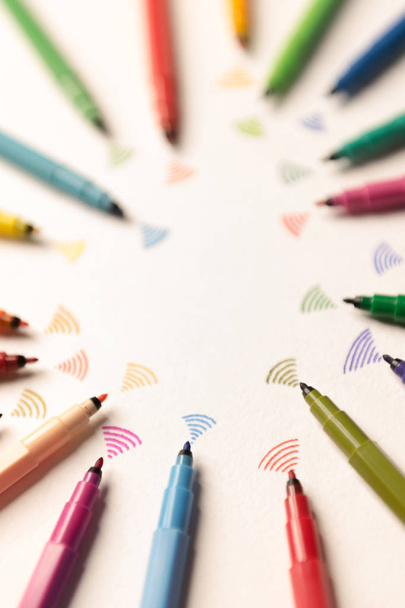 Group of colorful markers sending out wi-fi - 写真・画像