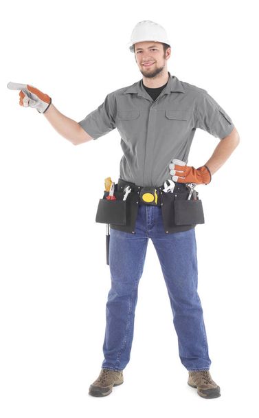 Handyman pointing on white - Фото, изображение