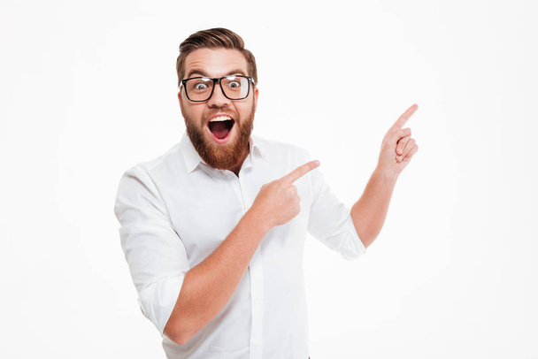 Happy excited bearded man in eyeglasses - Фото, зображення