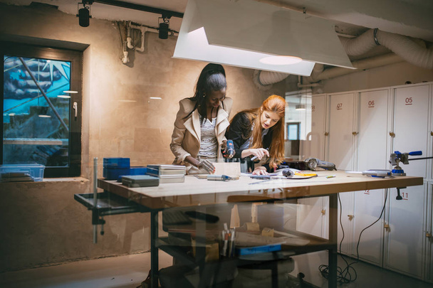 Designers working in modern office - Foto, imagen