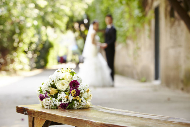 bouquet on wooden bench - Photo, Image