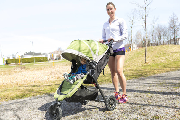 Mother doing Training, jogging with baby - Photo, Image