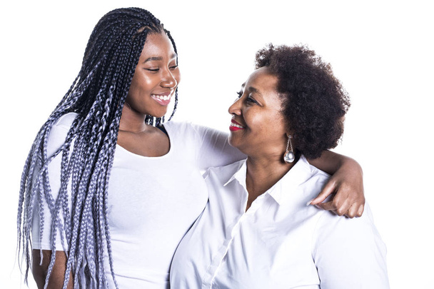 mother and her teenage daughter isolated on white - Fotó, kép