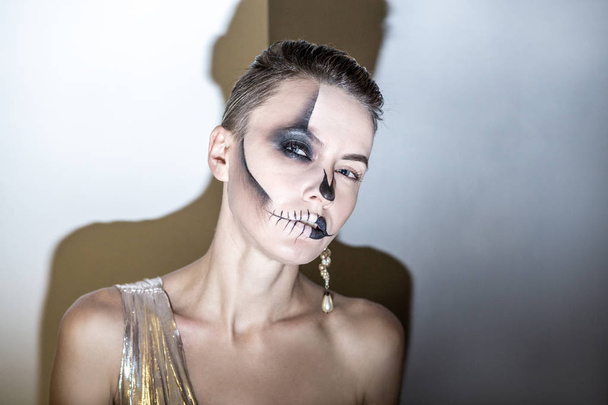Beautiful woman with bright black halloween makeup - Zdjęcie, obraz