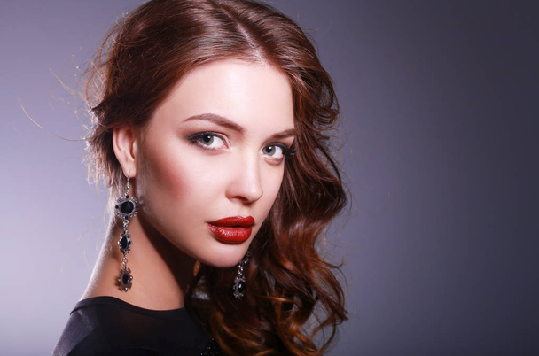 Beautiful woman with evening make-up in black dress - Zdjęcie, obraz
