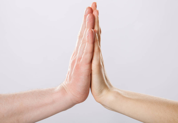 Two hands giving high five - Foto, Imagem
