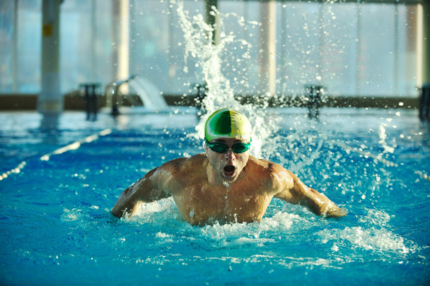  swimmer recreating on olimpic pool - Foto, Imagen