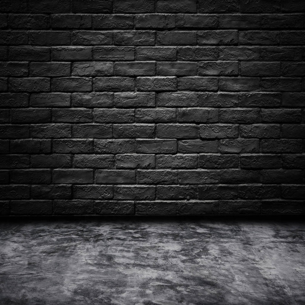 Camera scura con muro di mattoni neri
 - Foto, immagini