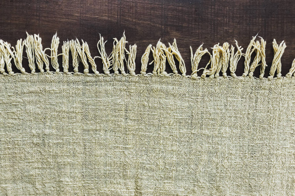 Beżowy dywan z grzywką - Zdjęcie, obraz