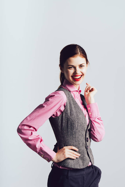 Laughing girl in a suit, office worker - Valokuva, kuva