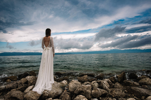 Beautiful bride standing outdoor - Photo, image