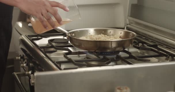 Cooking leeks and parmesan risotto video - Footage, Video